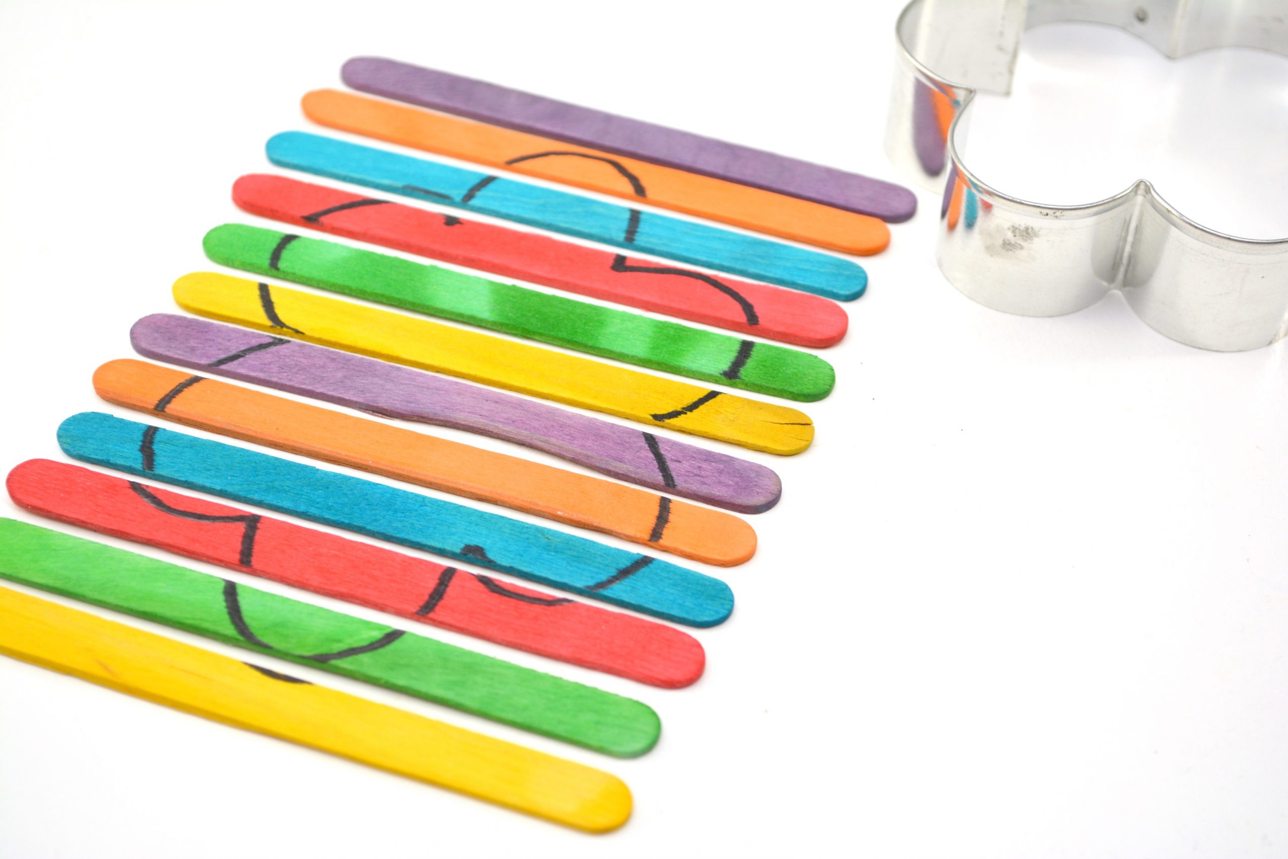 Easy Popsicle Stick Craft DIY Cookie Cutter Puzzle for Kids