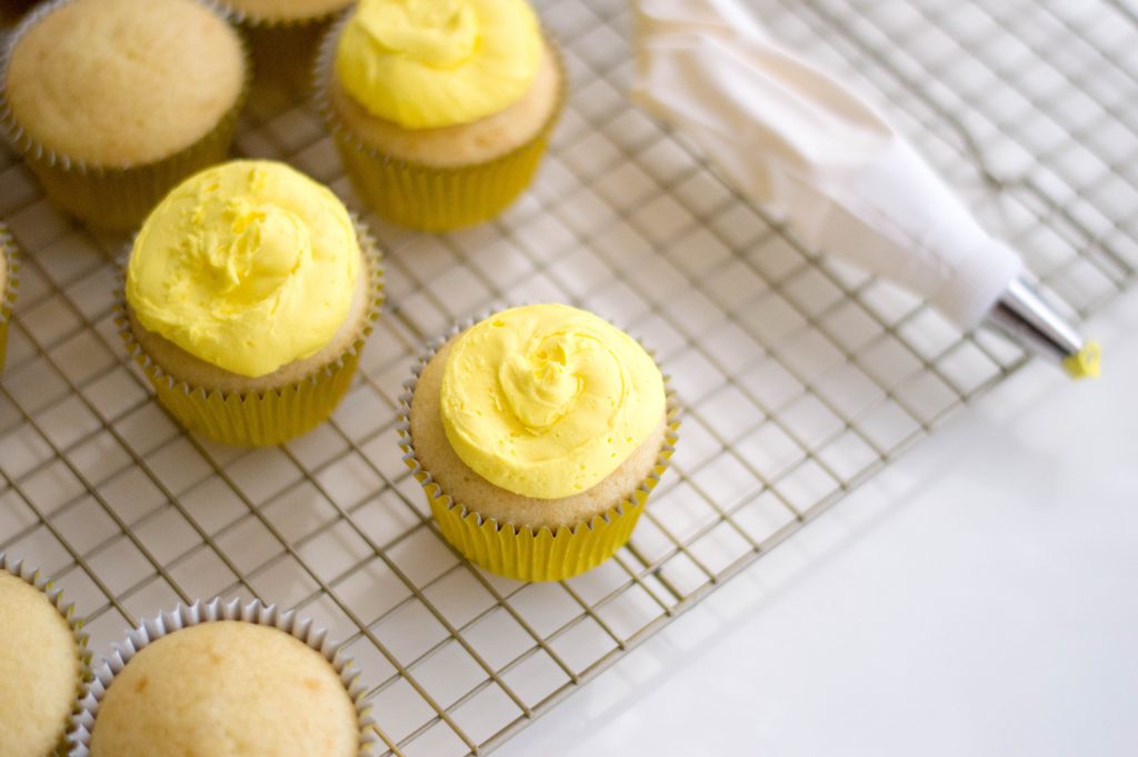 Yellow frosted cupcakes for Lego Cupcake Recipe