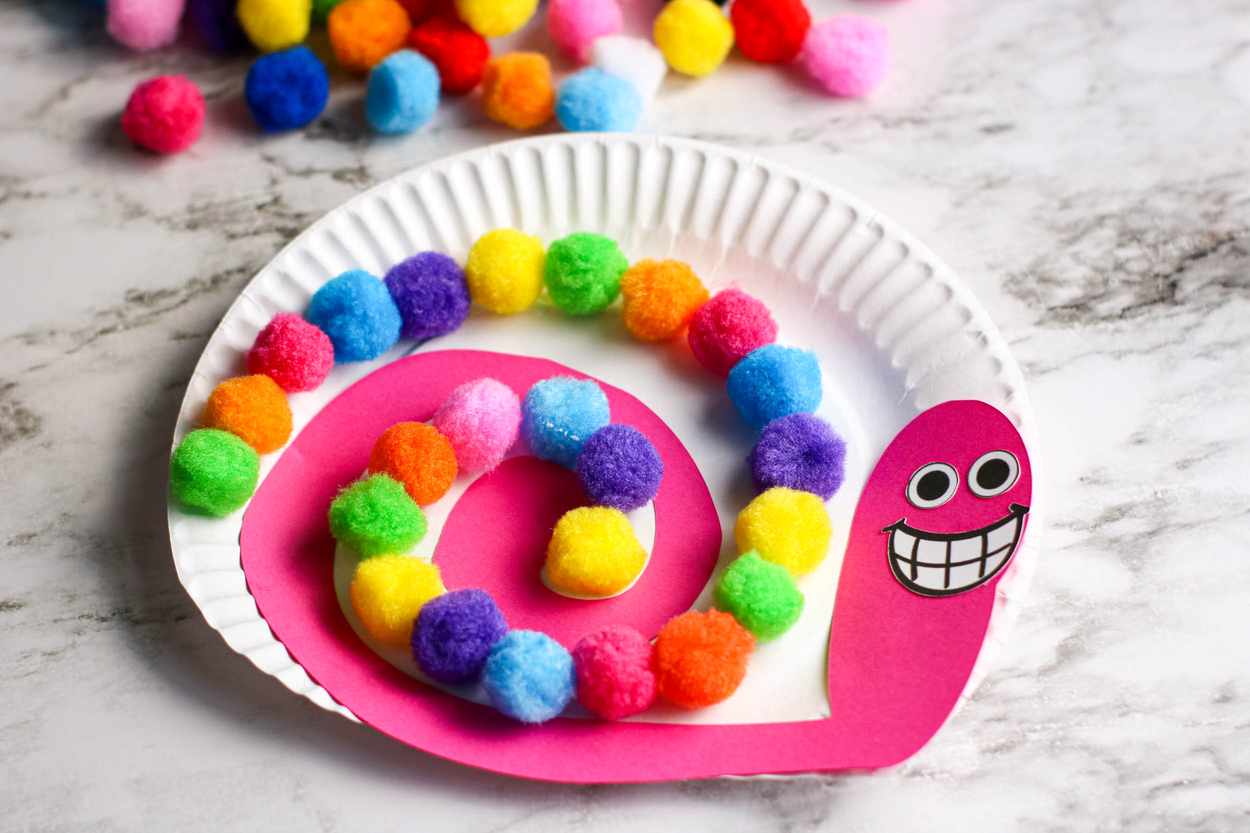 Colorful and Fun Pom Pom Snail Paper Plate Craft for Kids